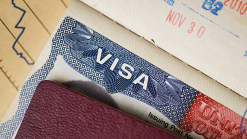 Lentini Visas | Immigration Services, Law Office of Jacqueline Lentini LLC | Diversity Visa (DV) Issuance Pause: What Applicants Should Know Now A passport lies on top of a visa. It feels like the start of a journey.