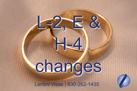 Two gold wedding ring bands with the title L-2, E & H-4 changes in the foreground. Lentini visas, phone number, and globe logo on the bottom of the photograph.